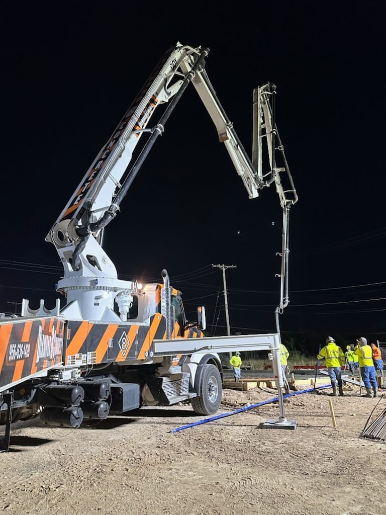 Diamond Eight concrete pump truck — night pour, South Texas
